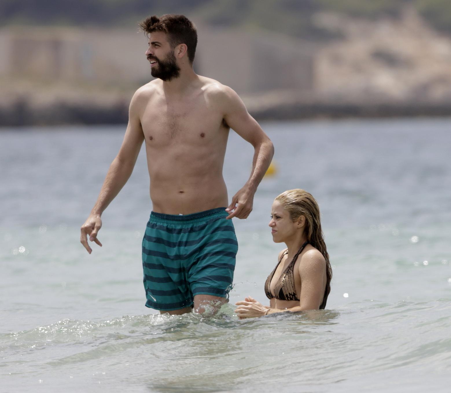 16P Shakira in a skimpy thong bikini at the beach