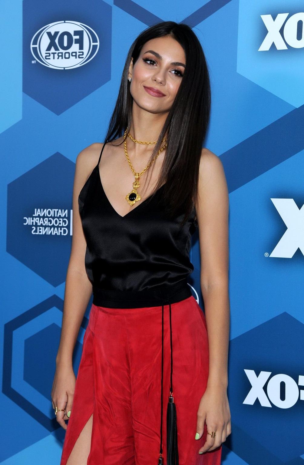 16P Victoria Justice cleavy and leggy in sexy bicolored dress
