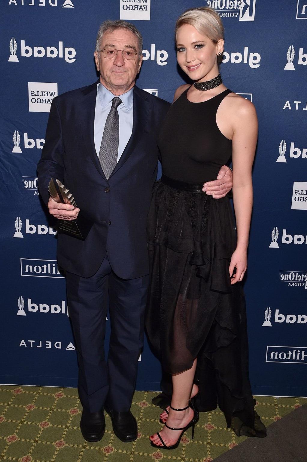 16P Jennifer Lawrence showing boobs in black sheer outfit
