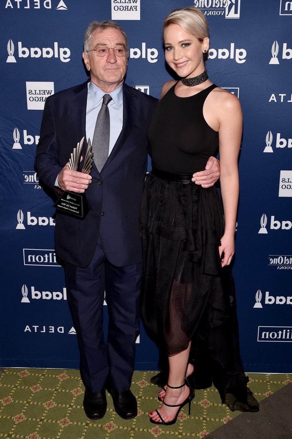 16P Jennifer Lawrence showing boobs in black sheer outfit