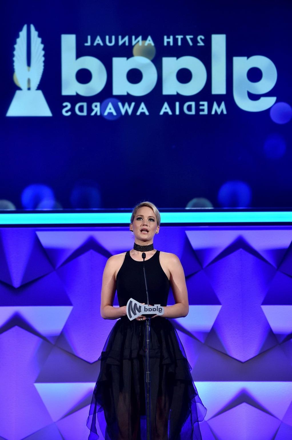 16P Jennifer Lawrence showing boobs in black sheer outfit