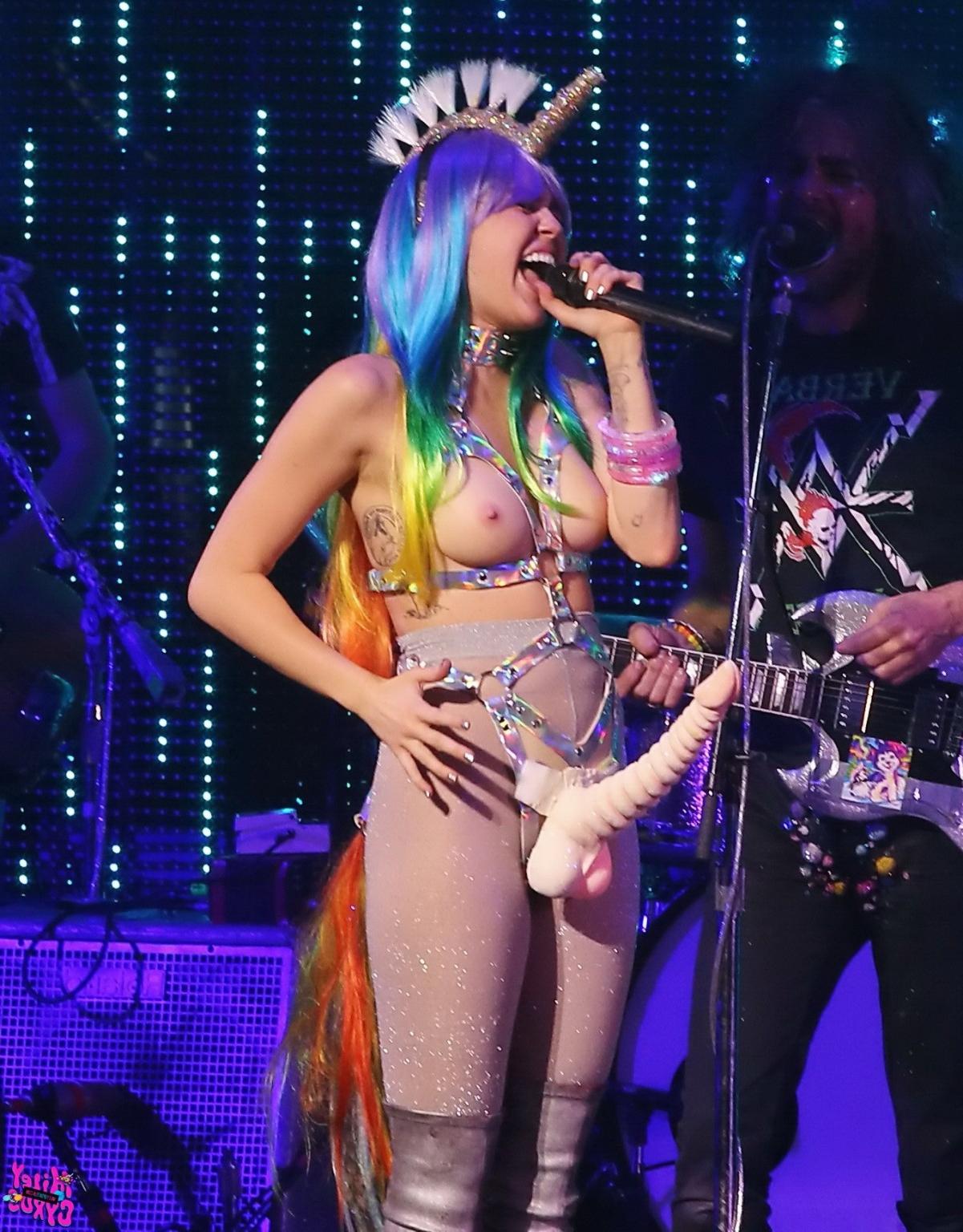 16P Miley Cyrus with plastic boobs vagina and huge dildo