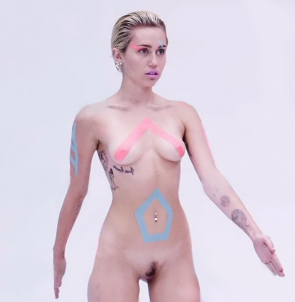16P Miley Cyrus showing off her bare boobs and pussy