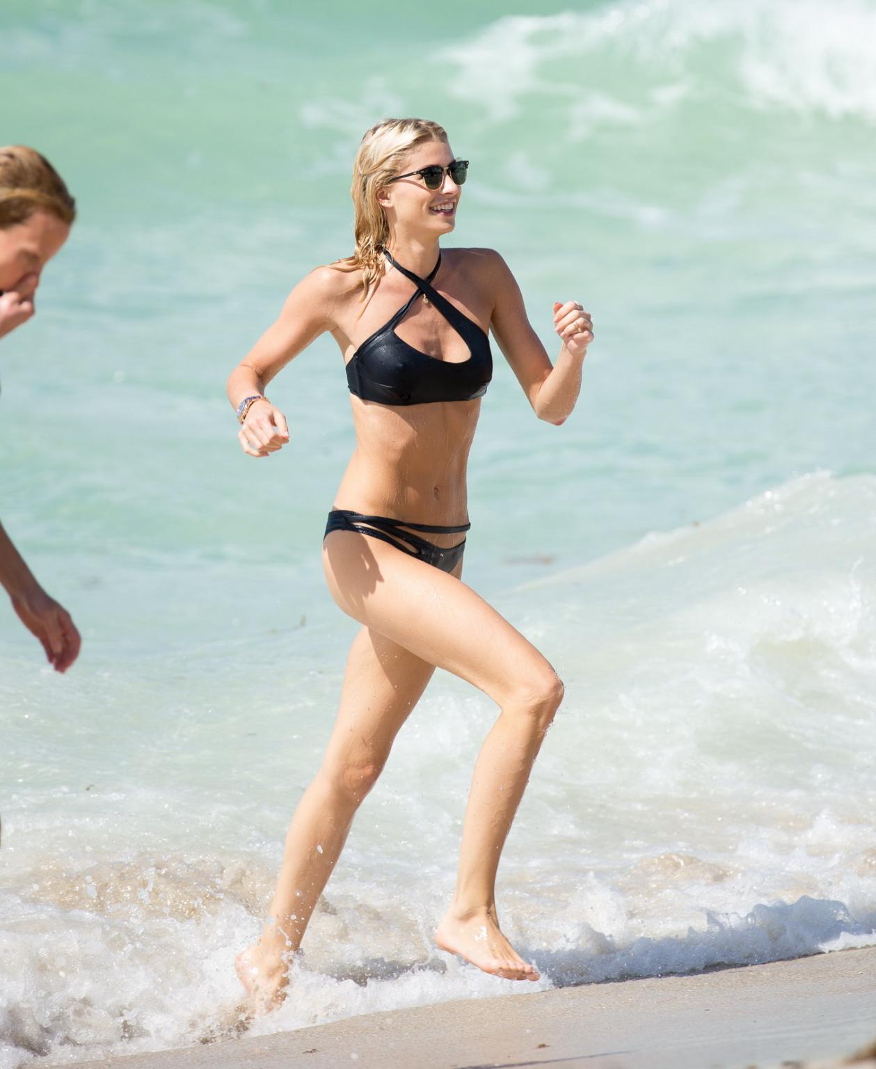 16P Lena Gercke showing nipple pokies in tiny black bikini