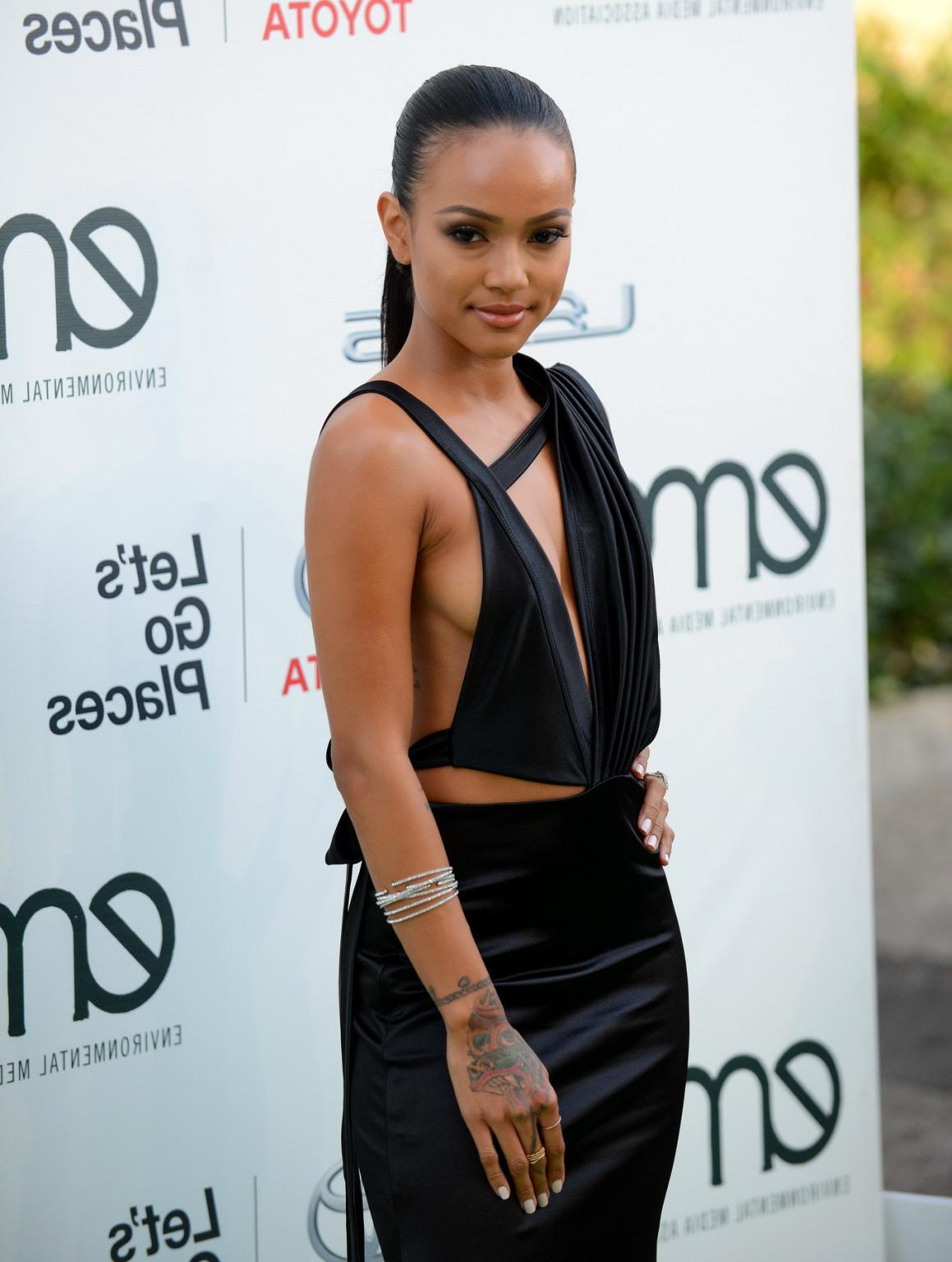 16P Karrueche Tran showing sideboob legs and cleavage