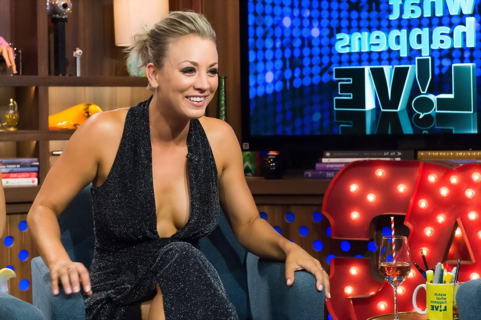16P Kaley Cuoco showing boobs braless in a low cut dress