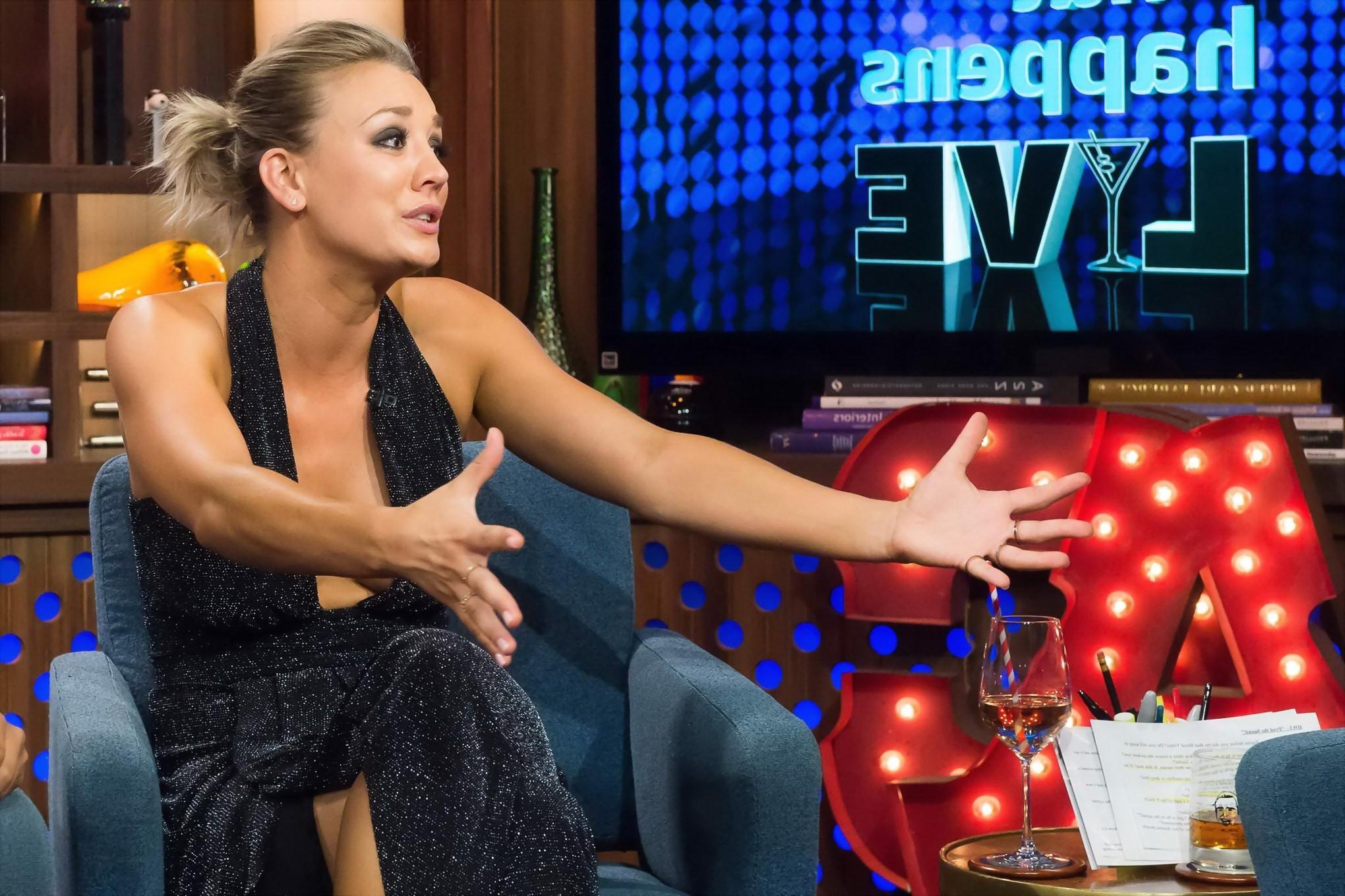 16P Kaley Cuoco showing boobs braless in a low cut dress