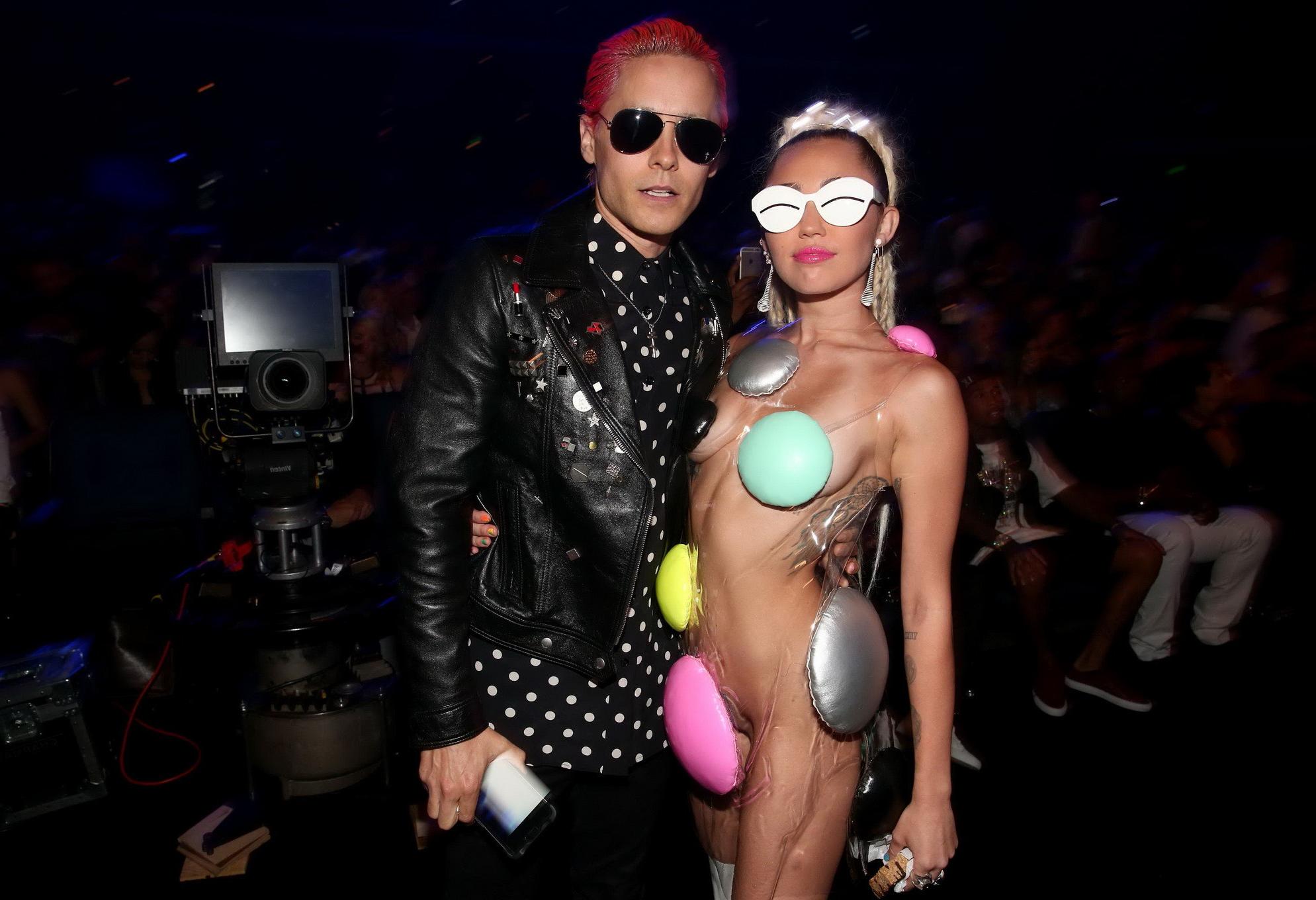 16P Miley Cyrus flashing her shaved pussy boobs and ass for MTV