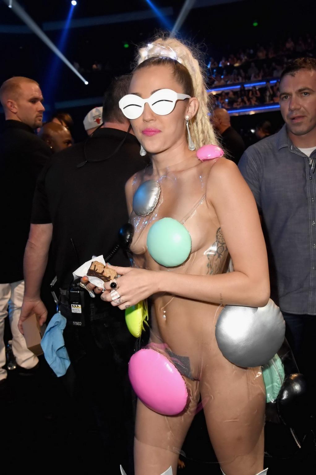 16P Miley Cyrus flashing her shaved pussy boobs and ass for MTV