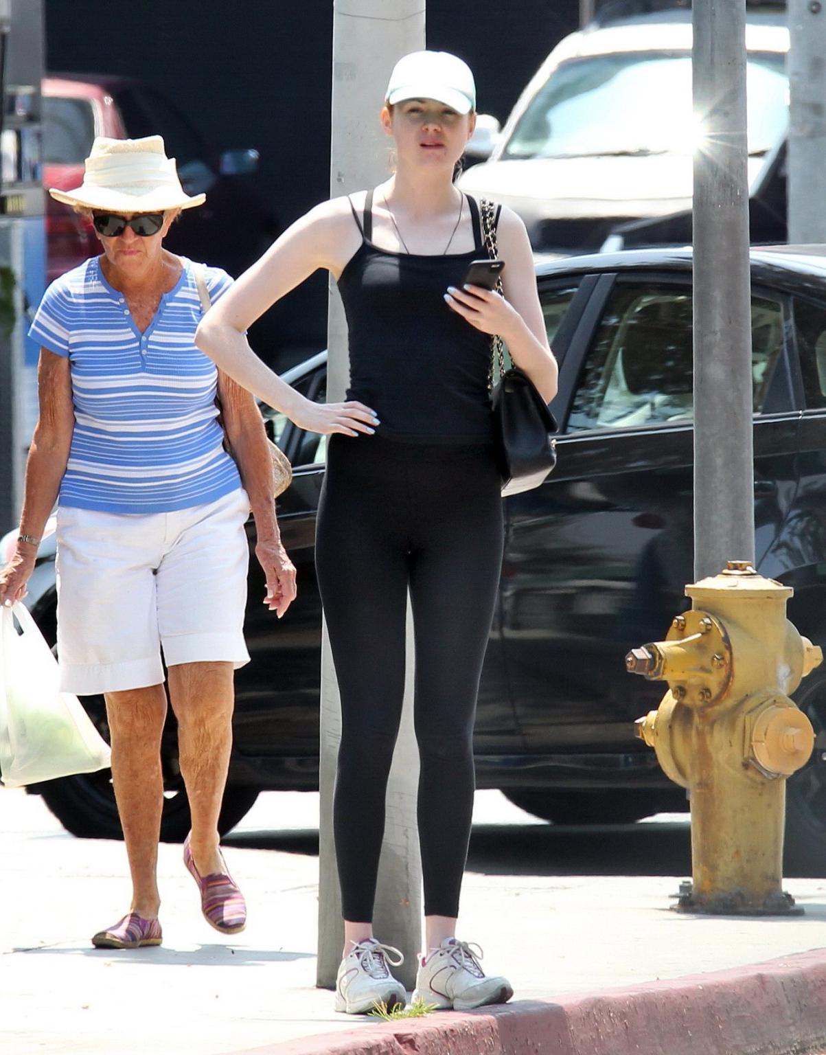 16P Karen Gillan shows off her ass wearing see through tights