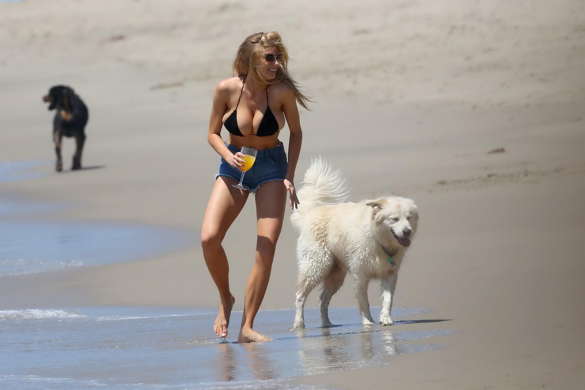 16P Charlotte McKinney showing melons in bikini top and shorts