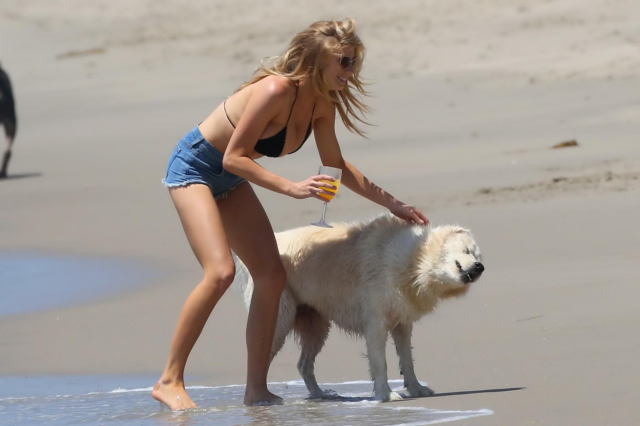 16P Charlotte McKinney showing melons in bikini top and shorts