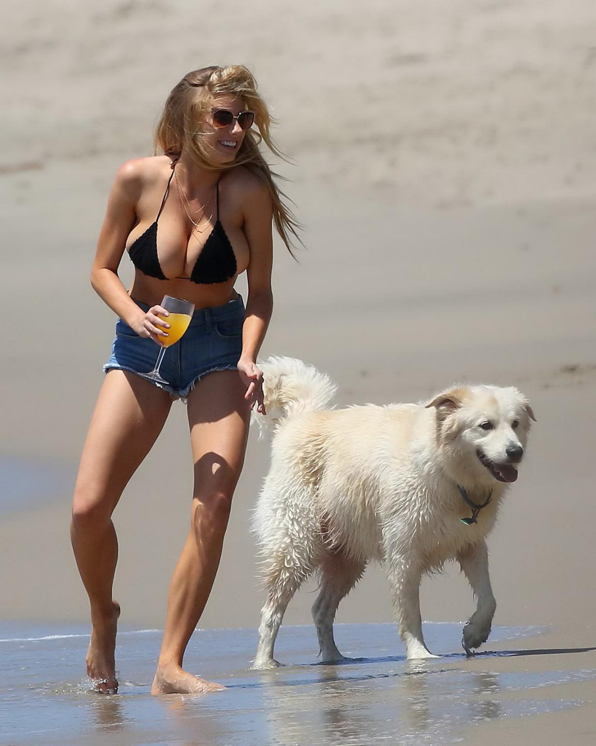 16P Charlotte McKinney showing melons in bikini top and shorts