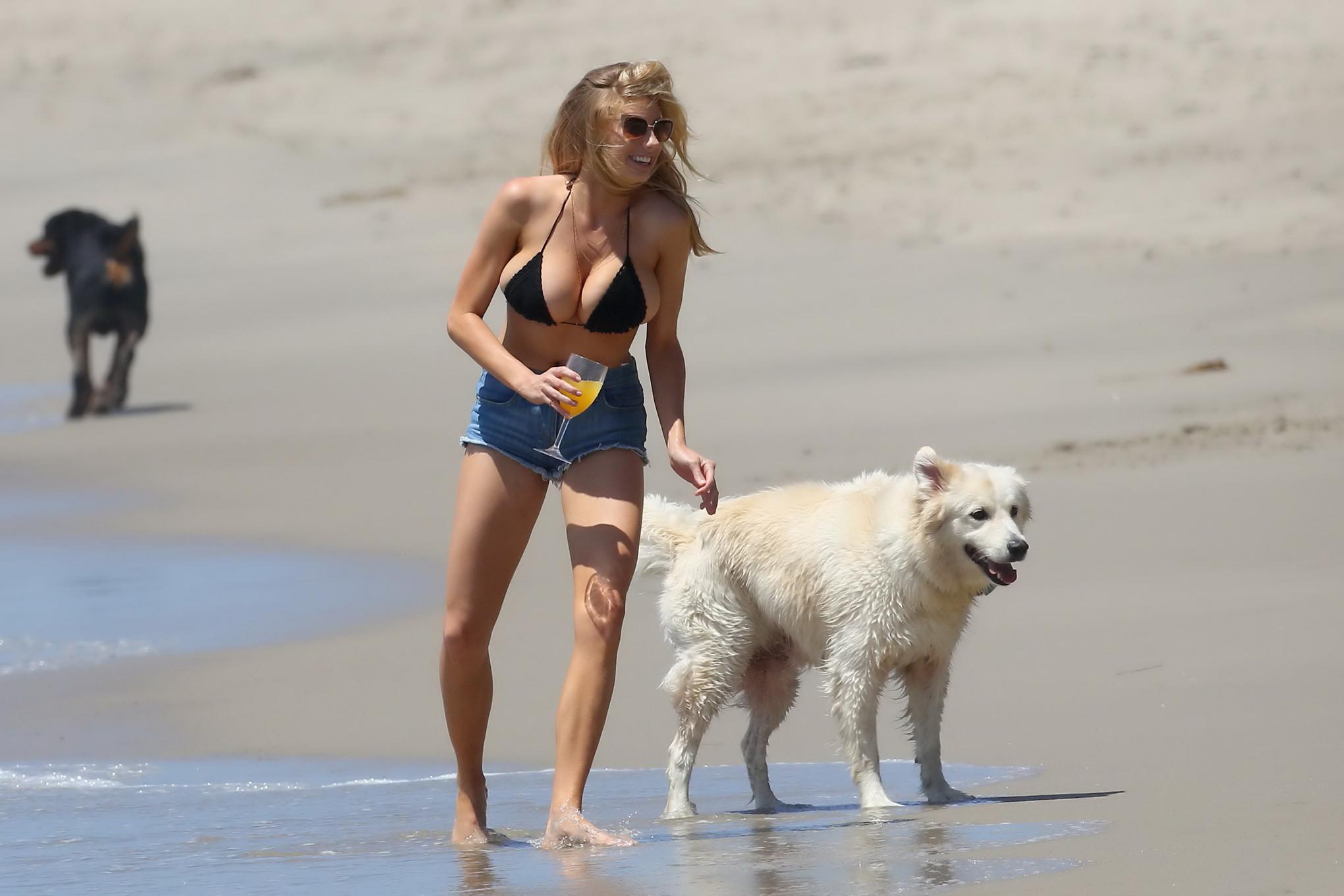 16P Charlotte McKinney showing melons in bikini top and shorts