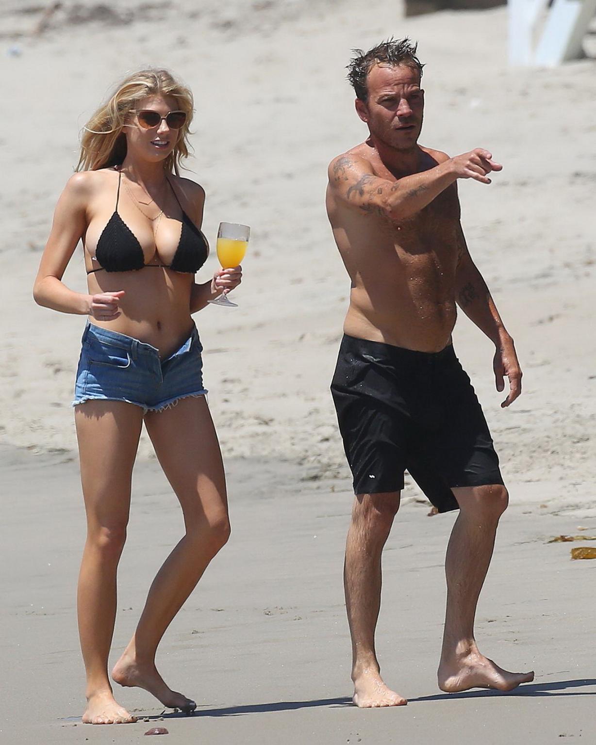 16P Charlotte McKinney showing melons in bikini top and shorts