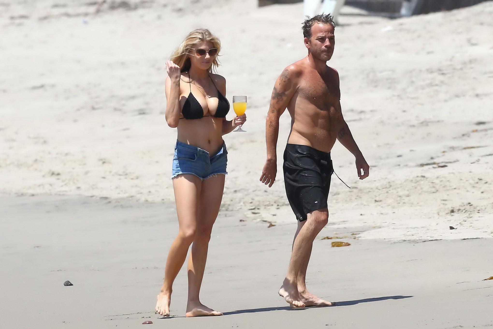 16P Charlotte McKinney showing melons in bikini top and shorts