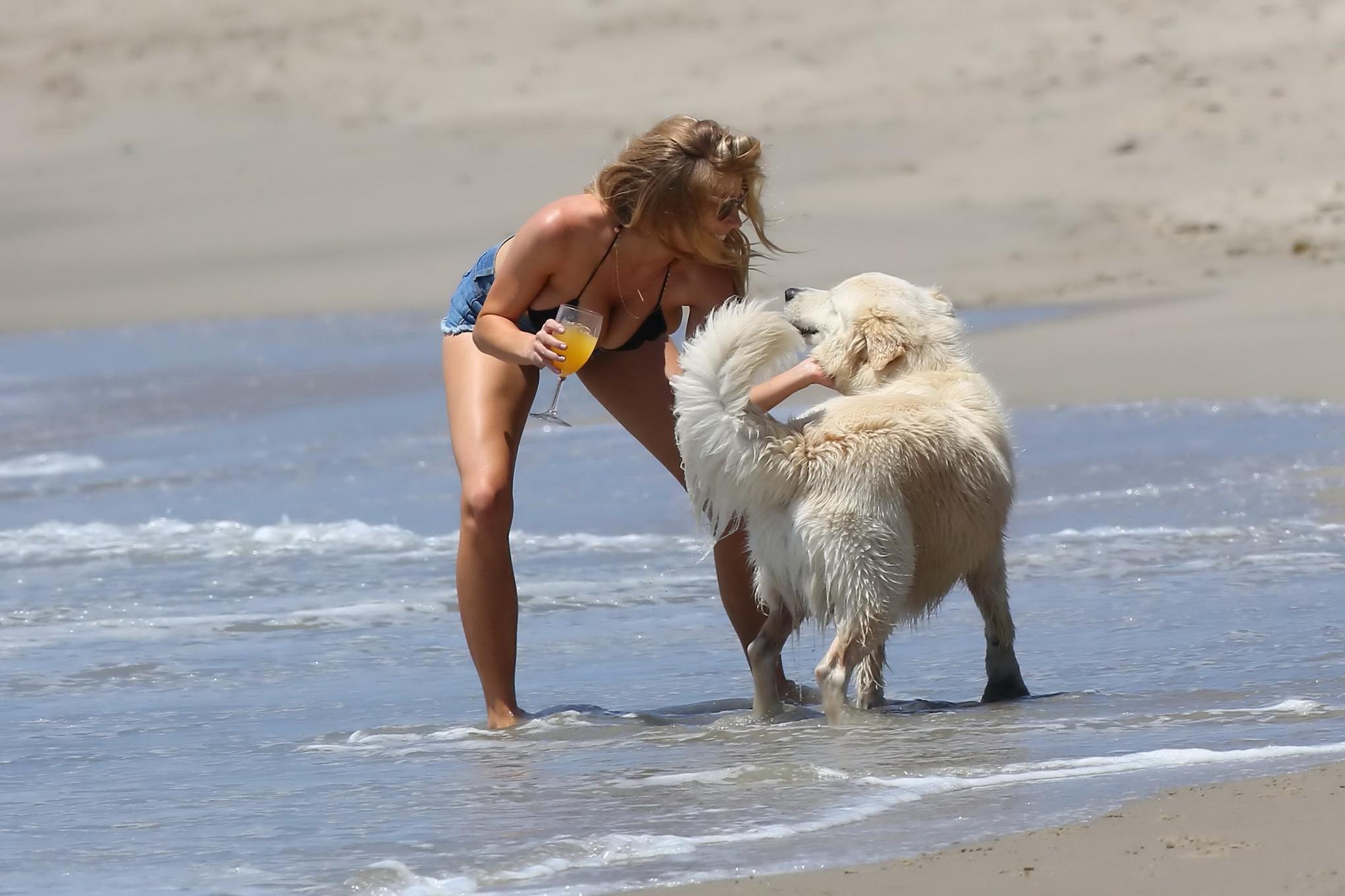 16P Charlotte McKinney showing melons in bikini top and shorts