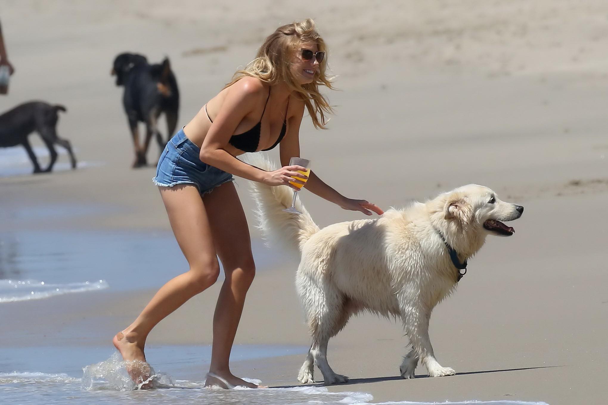 16P Charlotte McKinney showing melons in bikini top and shorts