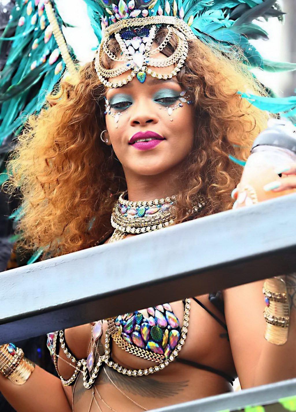 16P Rihanna wearing skimpy carnival costume