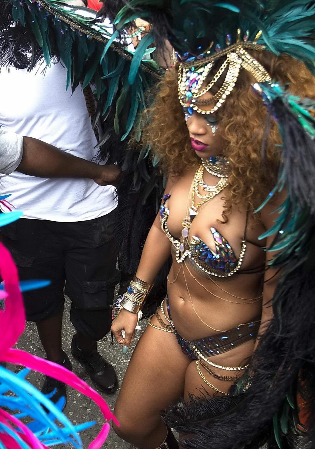 16P Rihanna wearing skimpy carnival costume