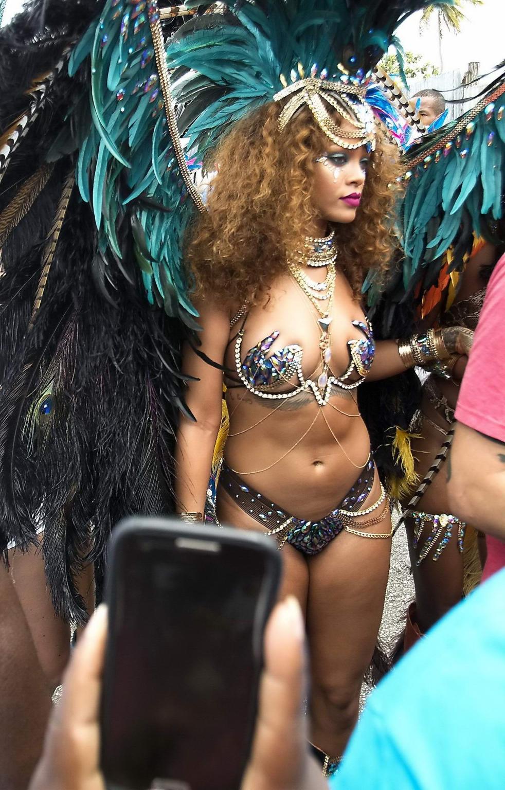 16P Rihanna wearing skimpy carnival costume