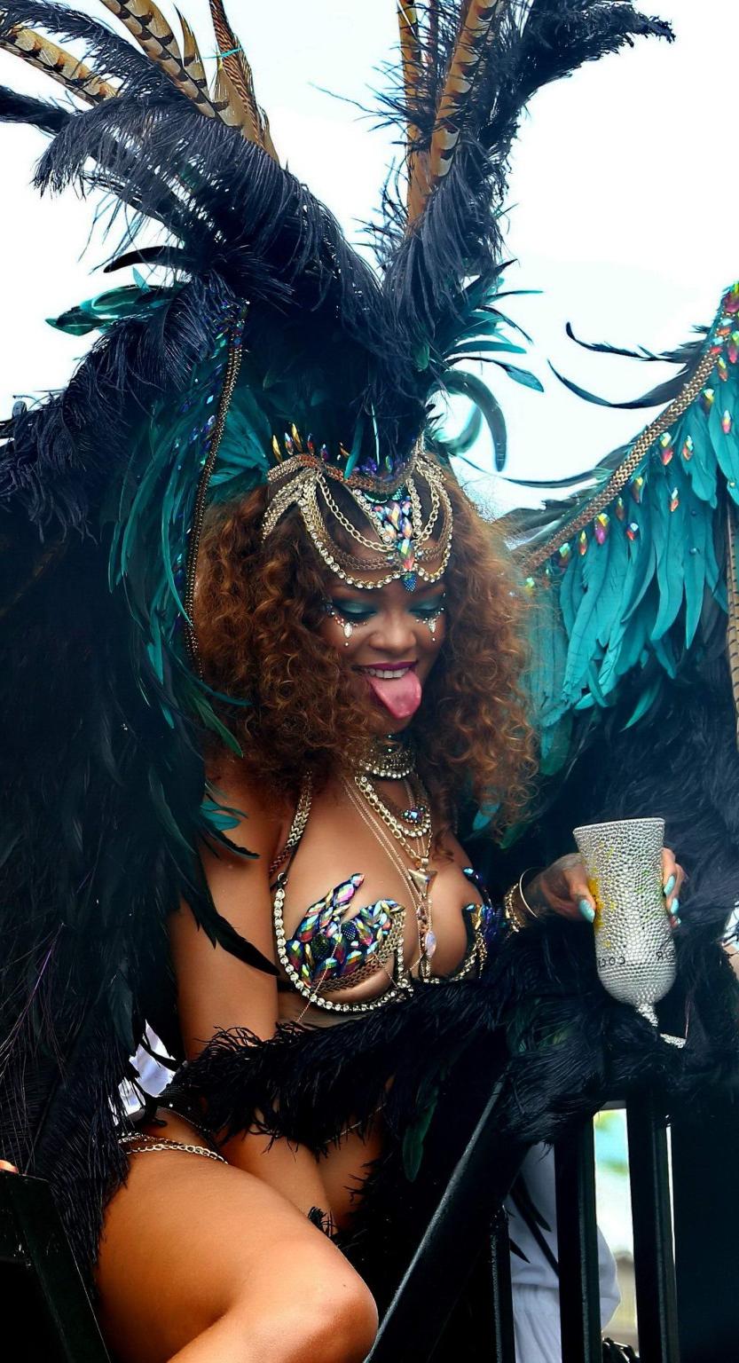 16P Rihanna wearing skimpy carnival costume