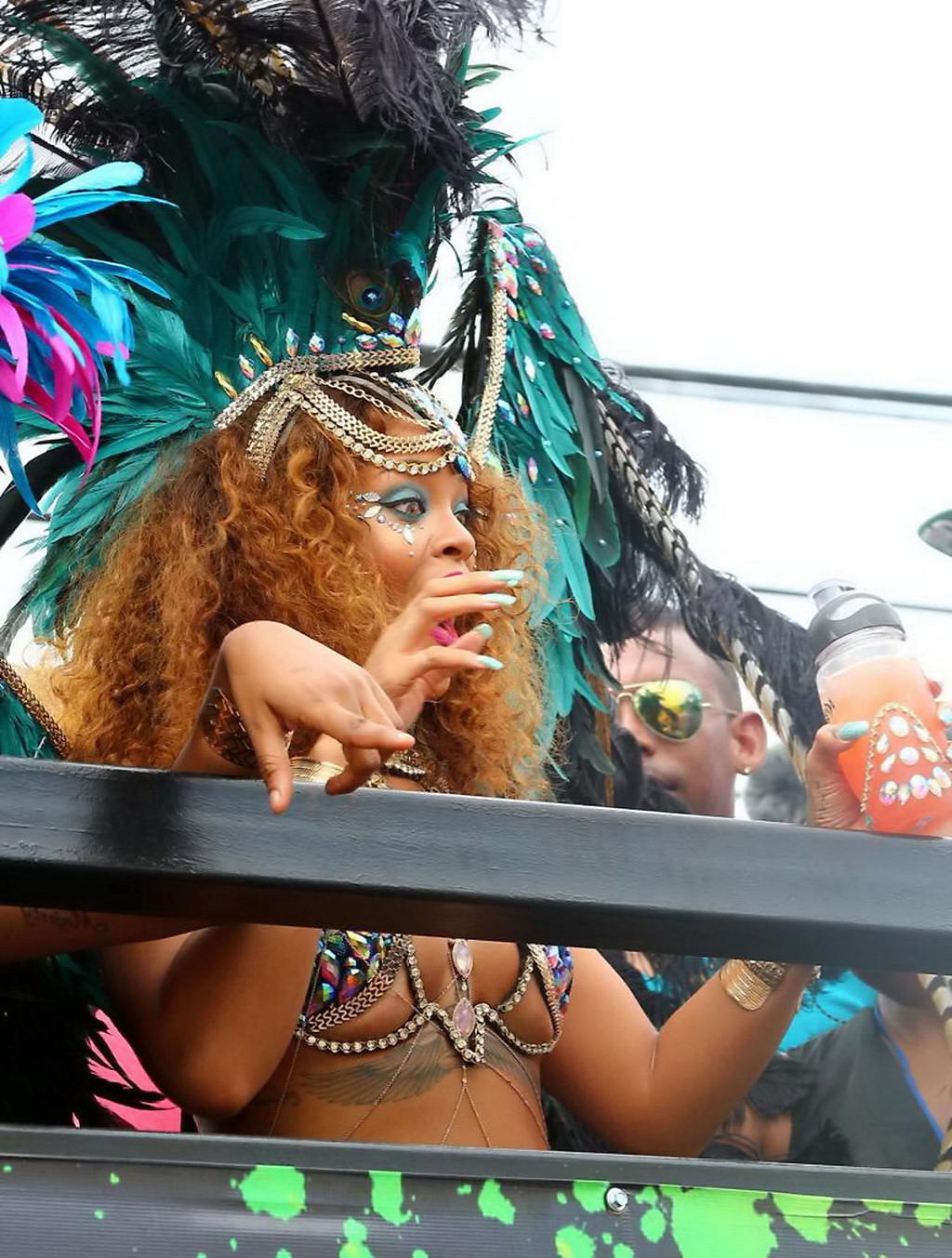 16P Rihanna wearing skimpy carnival costume