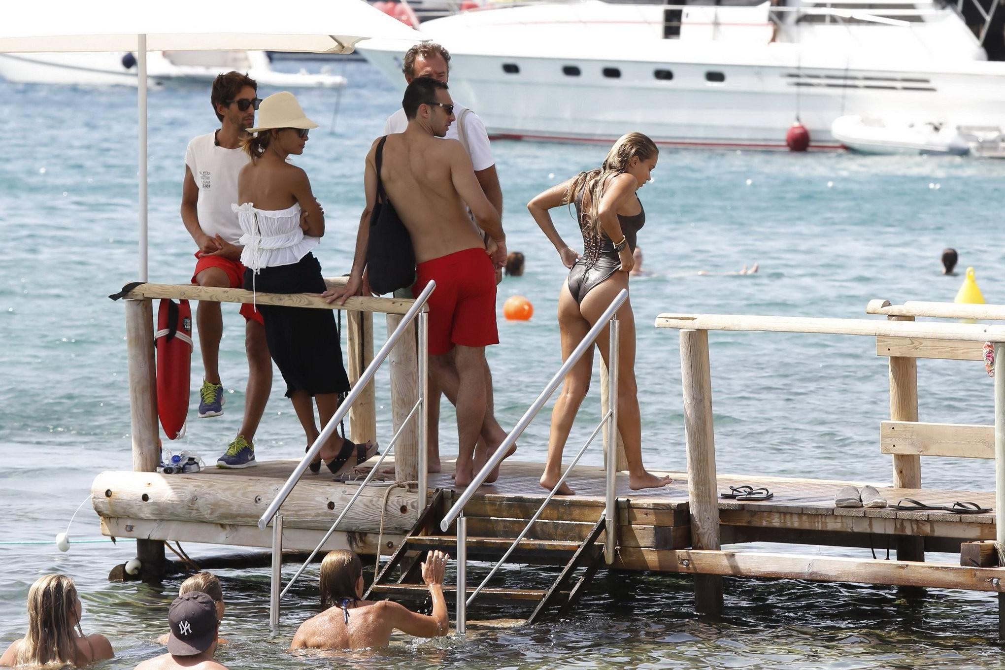 16P Sylvie Meis showing her big boobs in revealing swimsuit