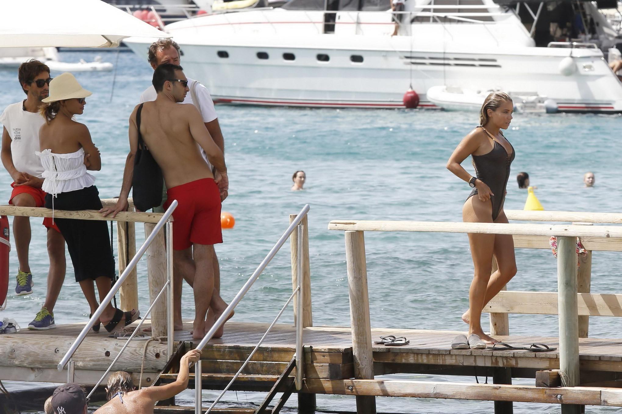 16P Sylvie Meis showing her big boobs in revealing swimsuit