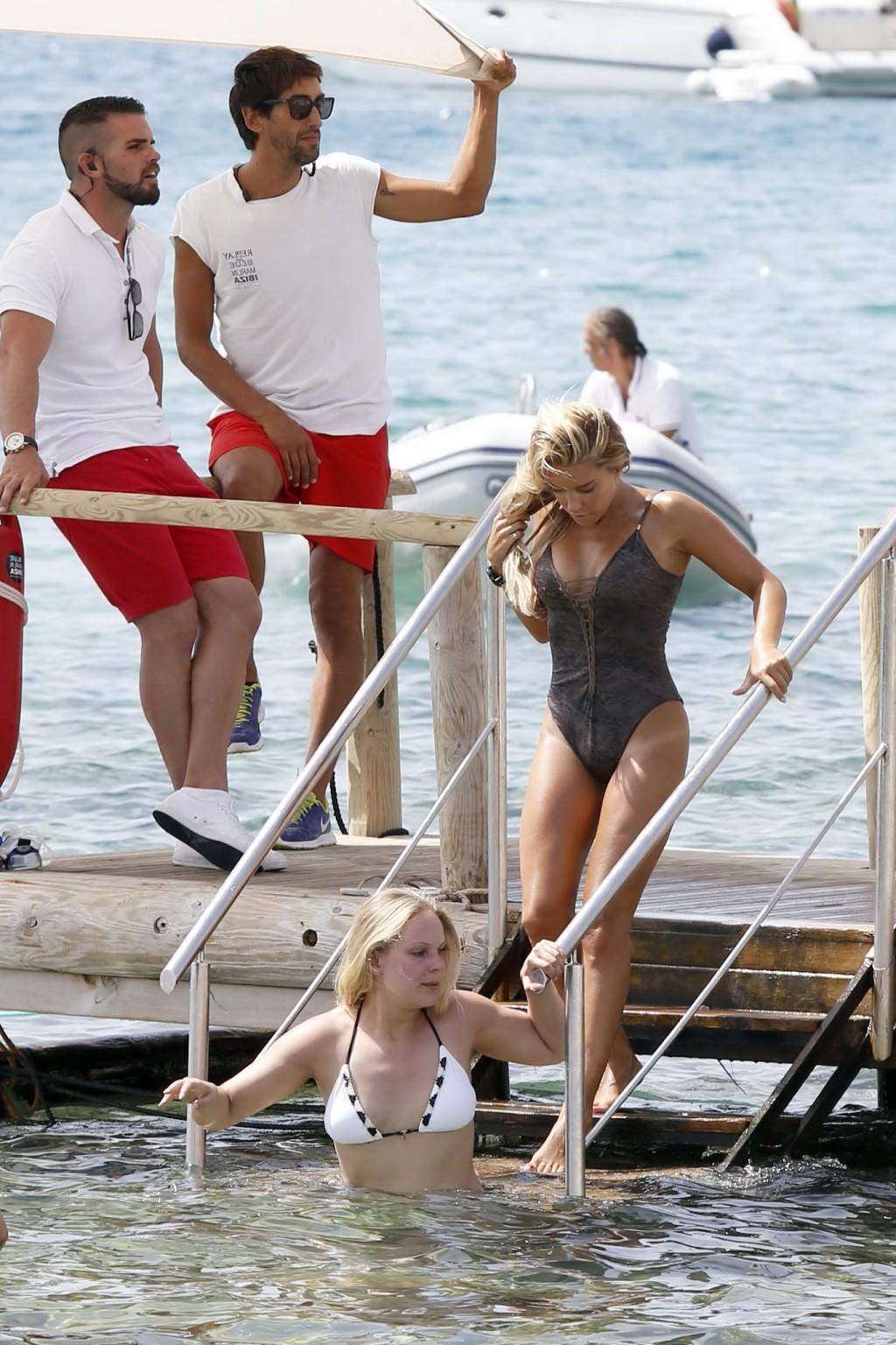 16P Sylvie Meis showing her big boobs in revealing swimsuit