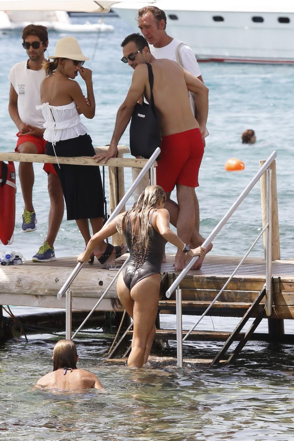 16P Sylvie Meis showing her big boobs in revealing swimsuit
