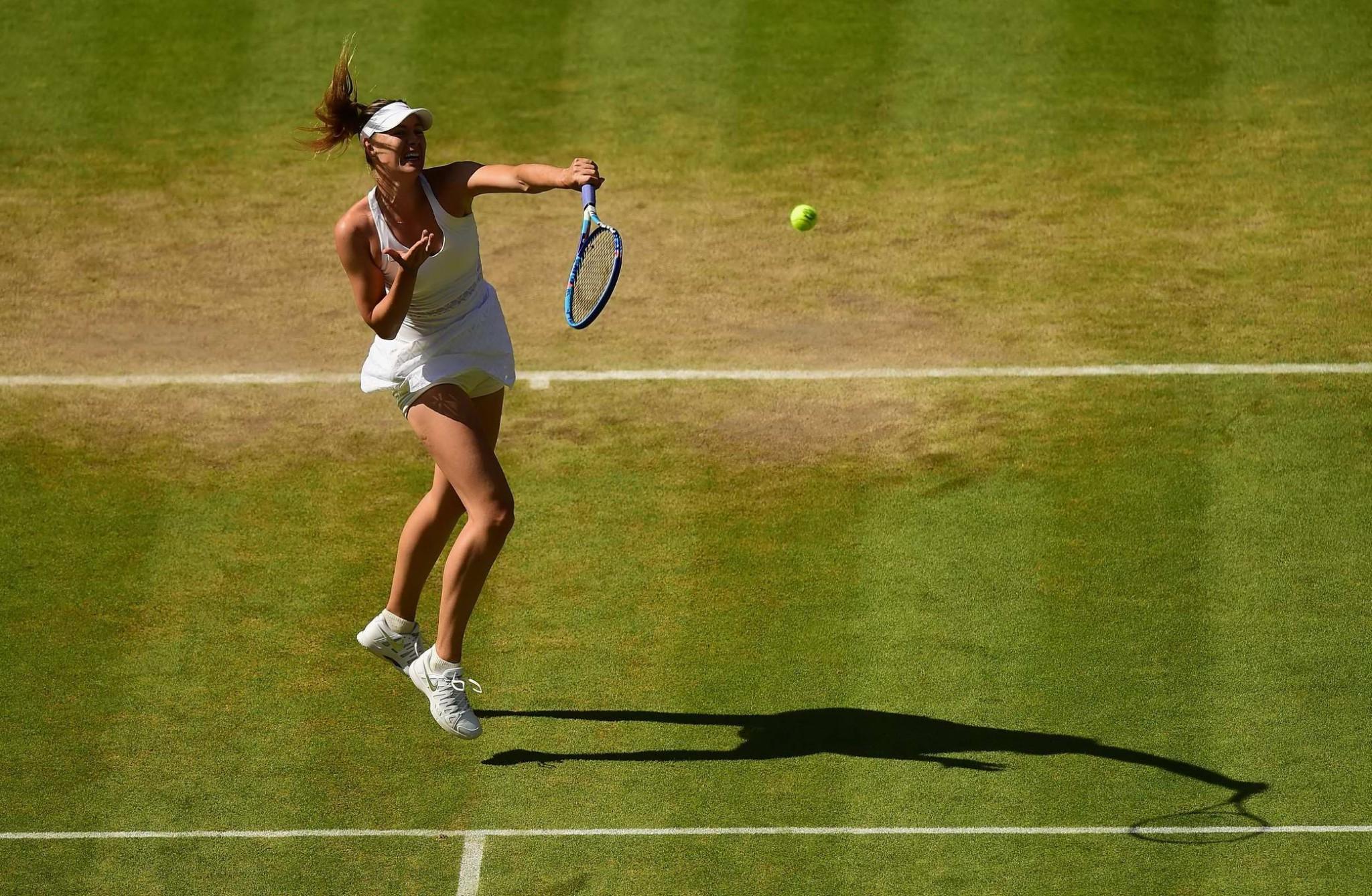 16P Maria Sharapova flashing her white panties at the Wimbledon