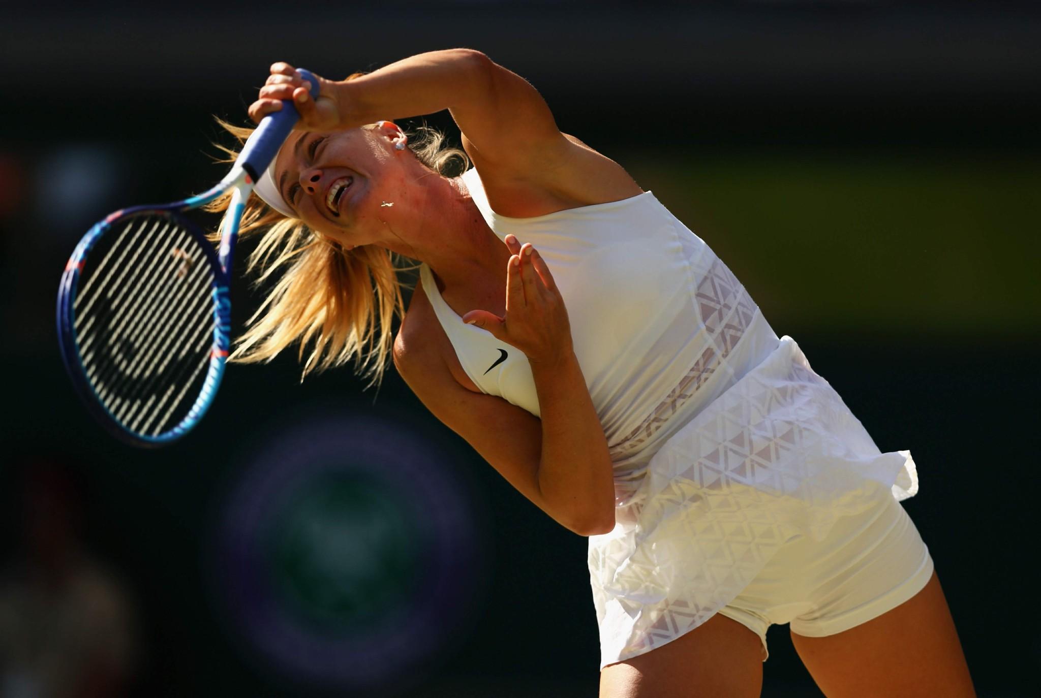 16P Maria Sharapova flashing her white panties at the Wimbledon