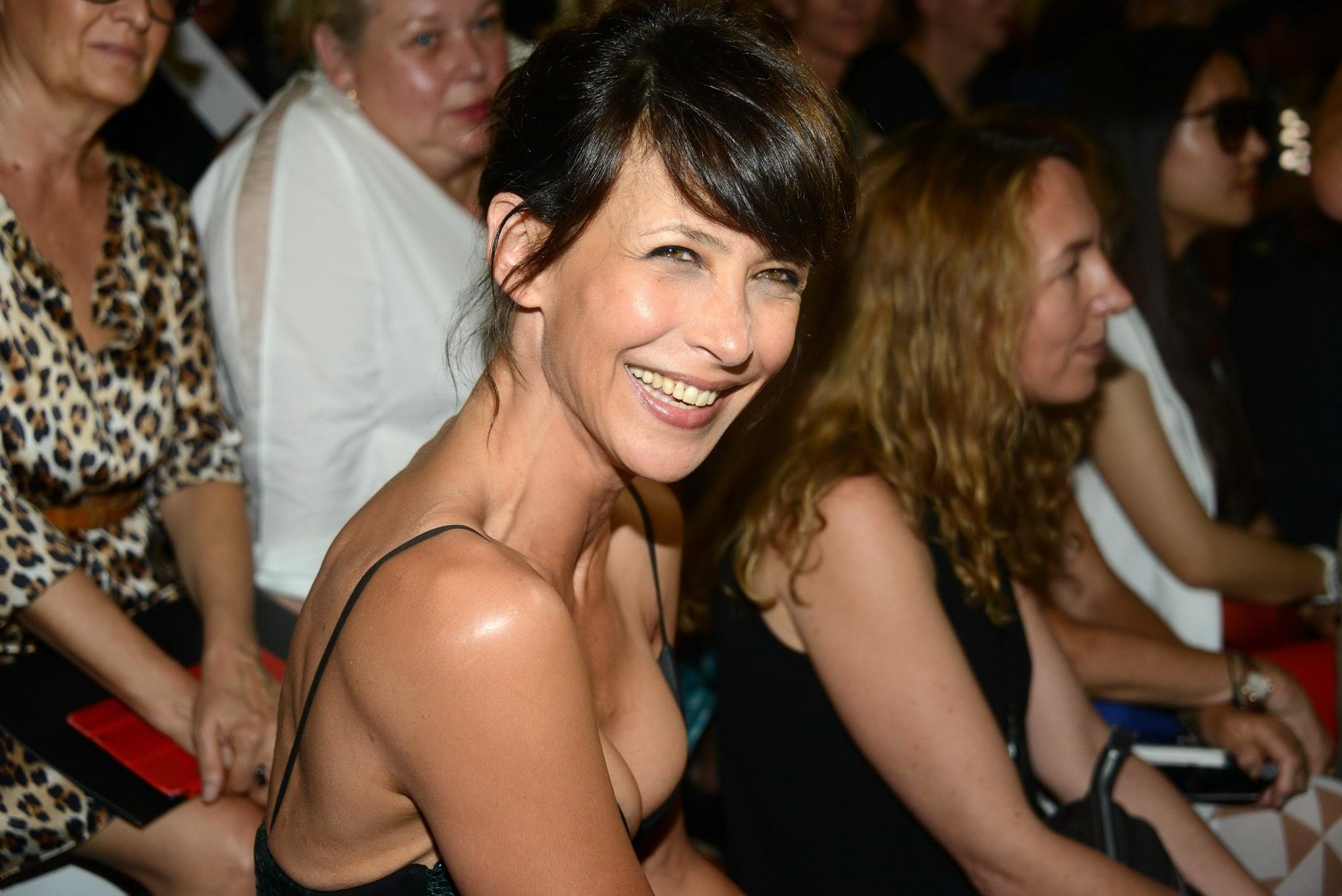 16P Sophie Marceau showing huge cleavage in Paris