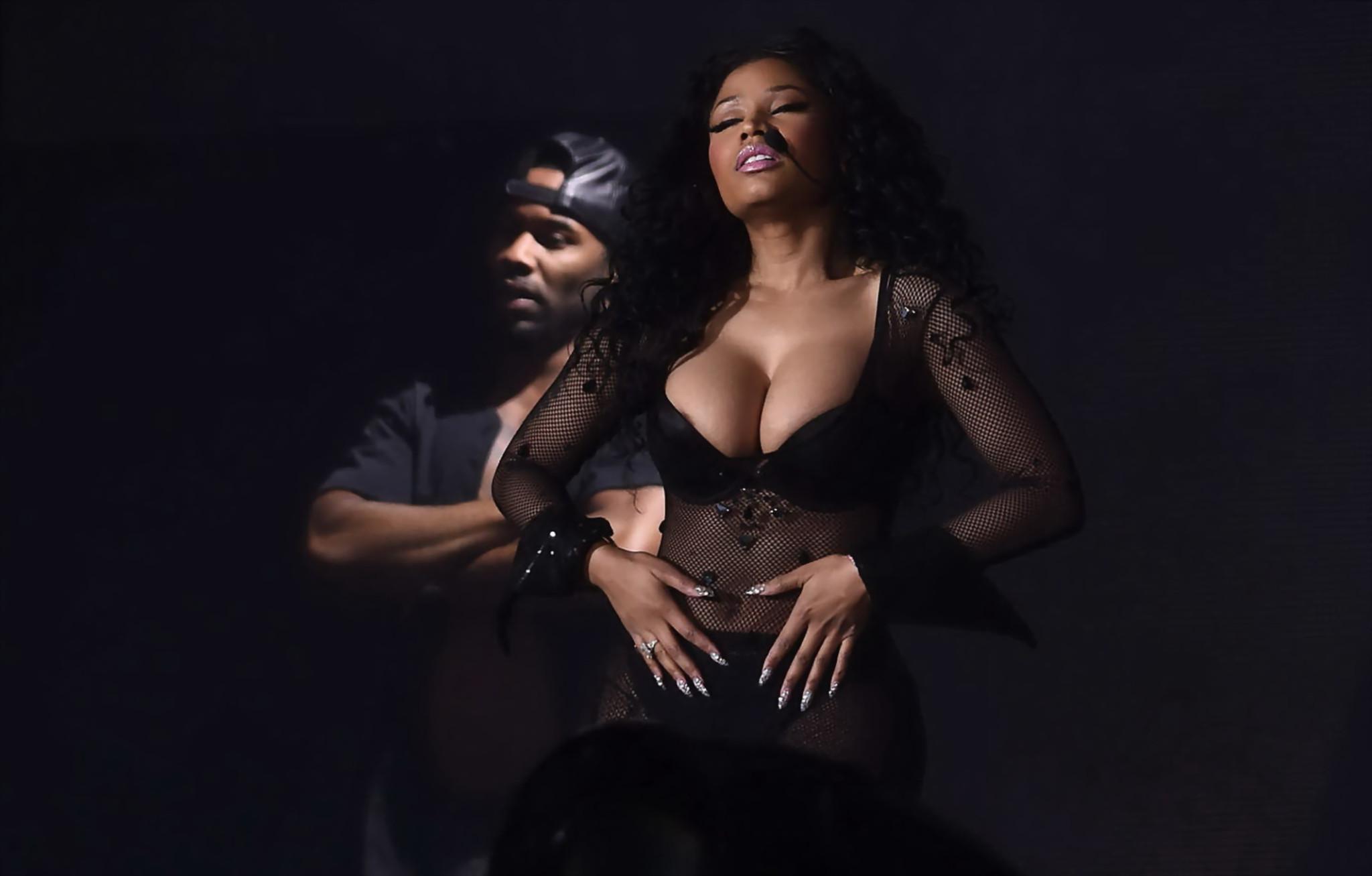 16P NIcki Minaj hot nipple slip in a fishnet jumpsuit