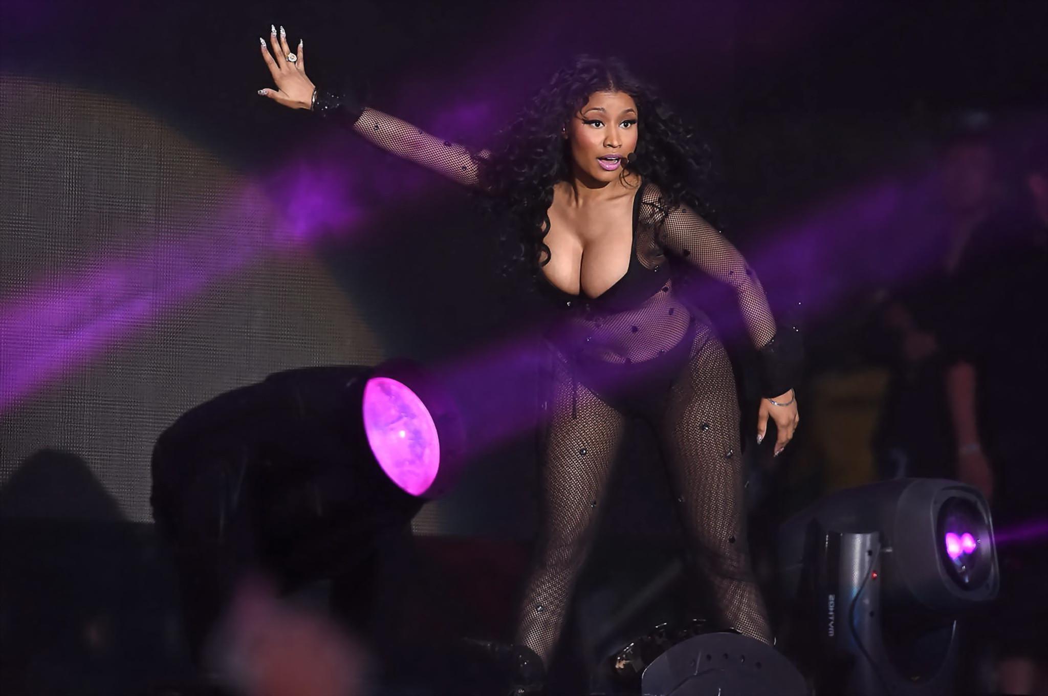 16P NIcki Minaj hot nipple slip in a fishnet jumpsuit