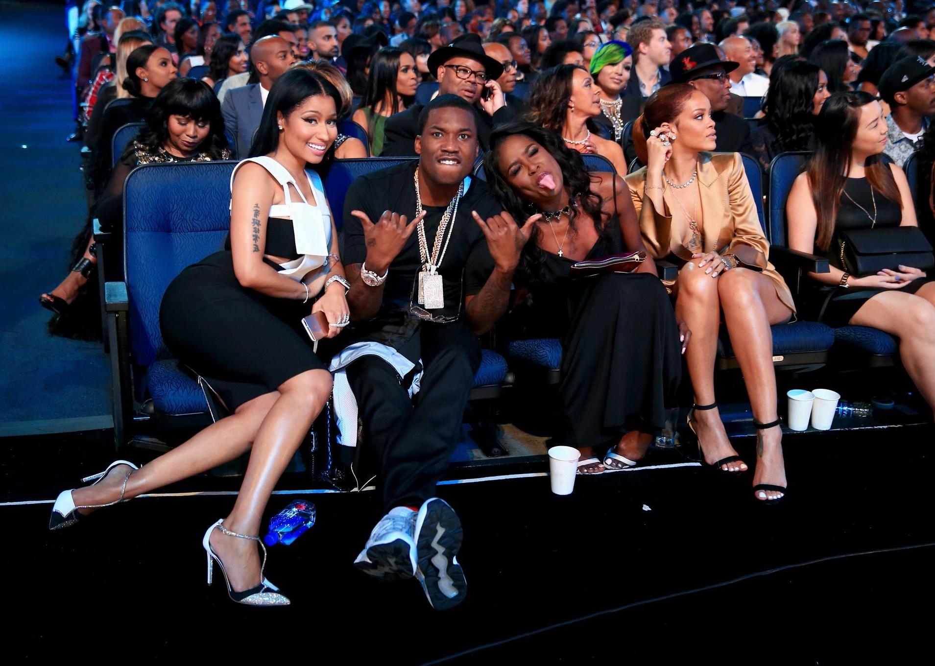 16P Rihanna braless wearing a wide open jacket at the BET Awards