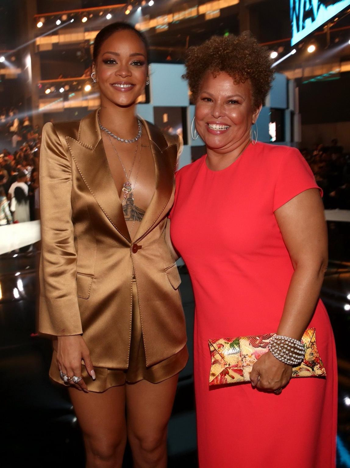 16P Rihanna braless wearing a wide open jacket at the BET Awards