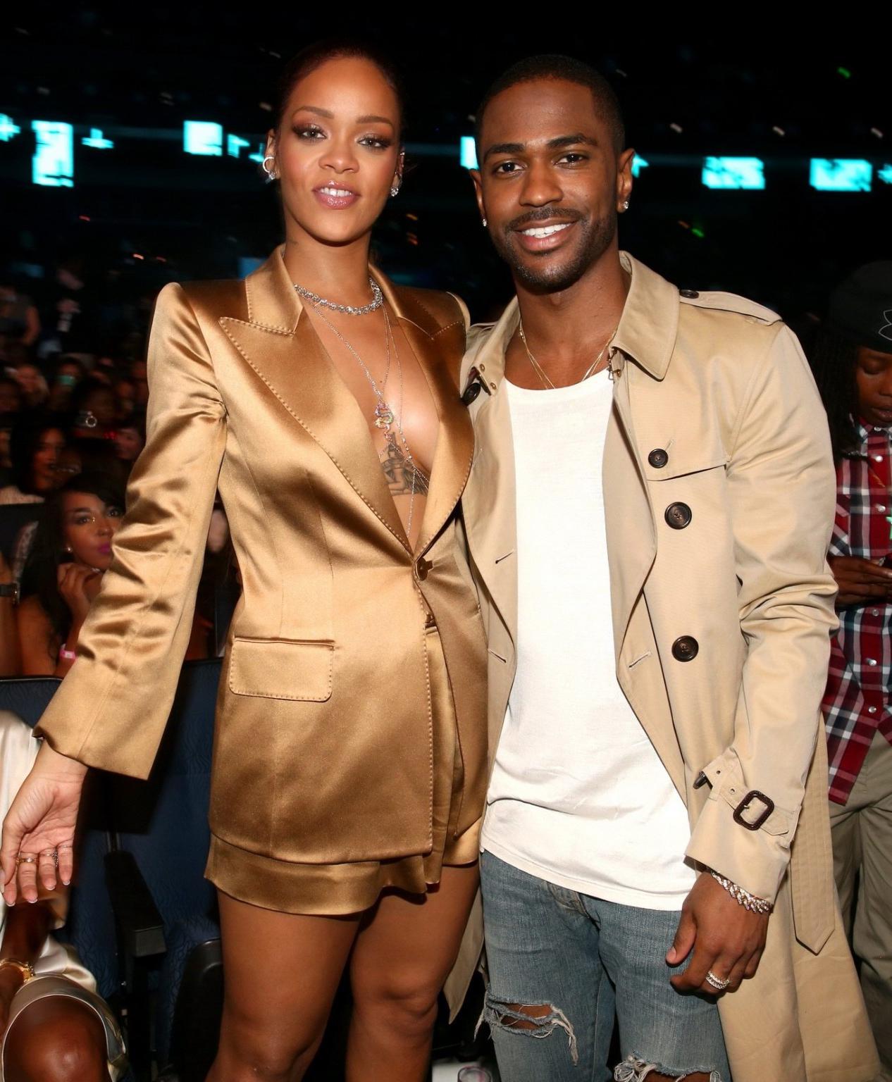 16P Rihanna braless wearing a wide open jacket at the BET Awards