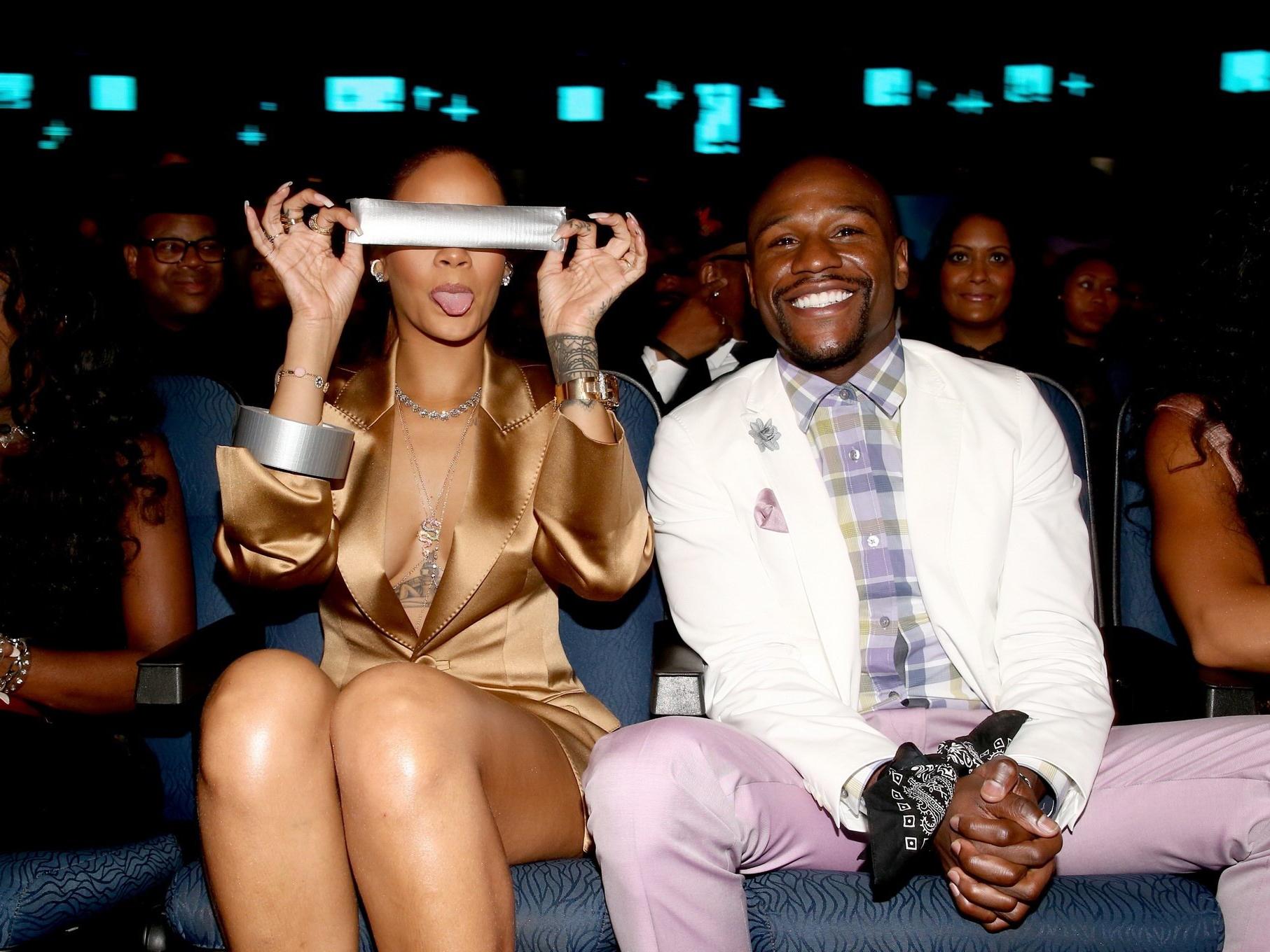 16P Rihanna braless wearing a wide open jacket at the BET Awards