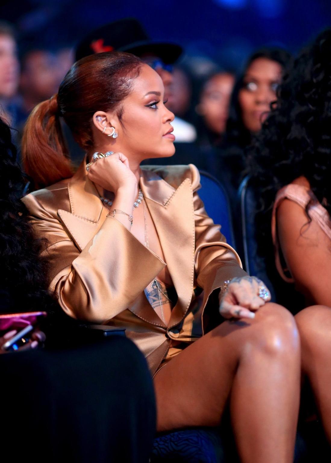 16P Rihanna braless wearing a wide open jacket at the BET Awards