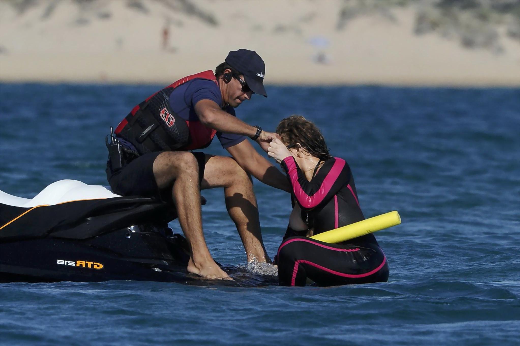 16P Mariah Carey hot boob slip at the beach in Sardinia