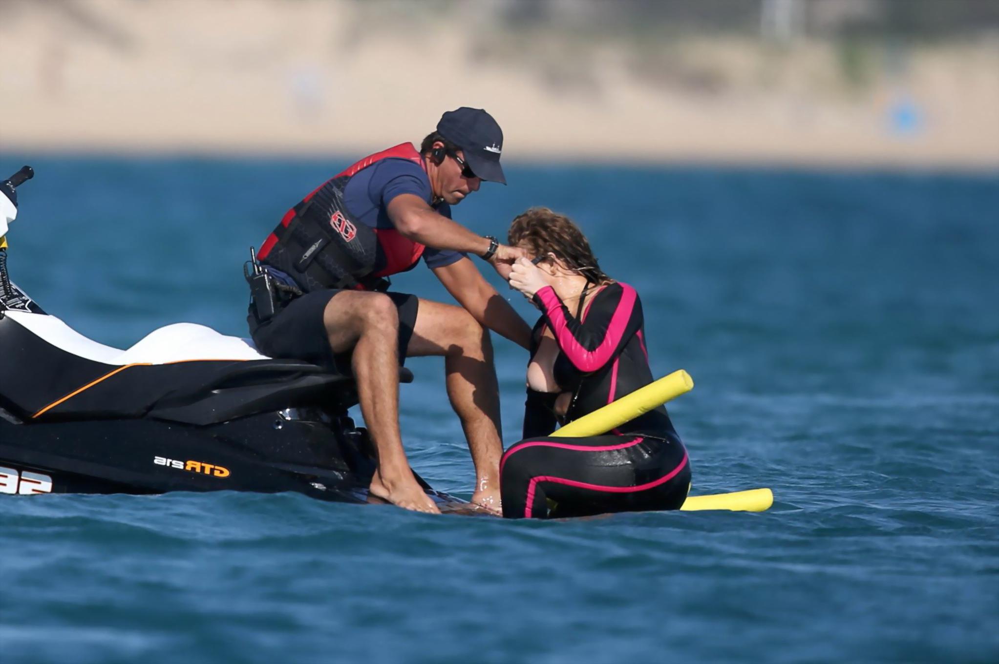 16P Mariah Carey hot boob slip at the beach in Sardinia