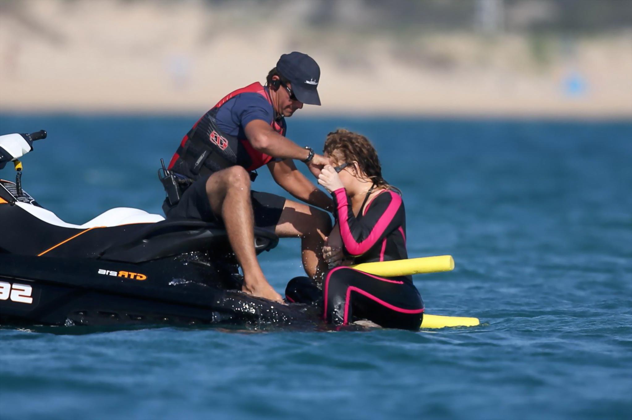 16P Mariah Carey hot boob slip at the beach in Sardinia