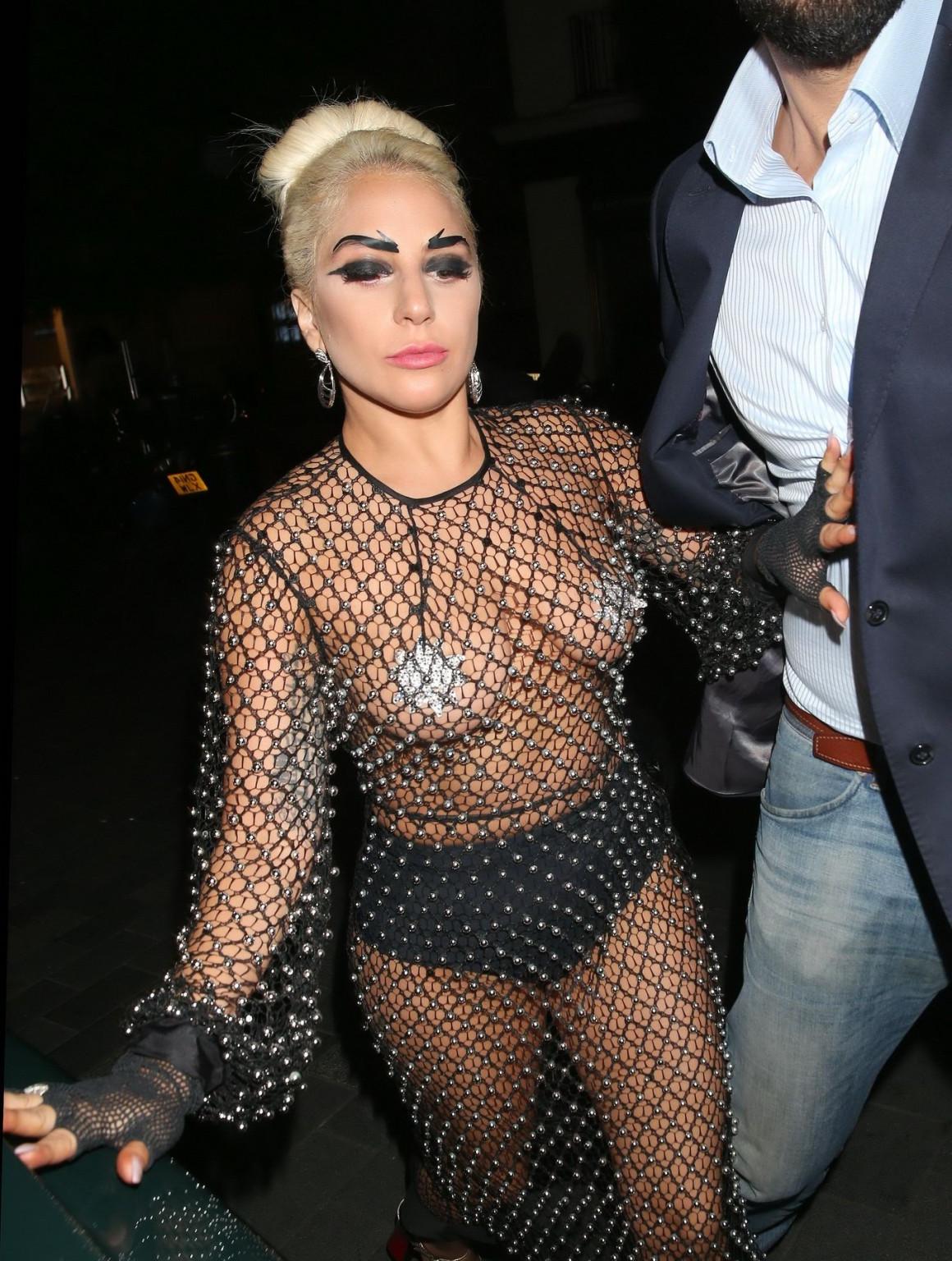 16P Lady Gaga bares all in a seethrough jewelled jumpsuit with nipple tassels