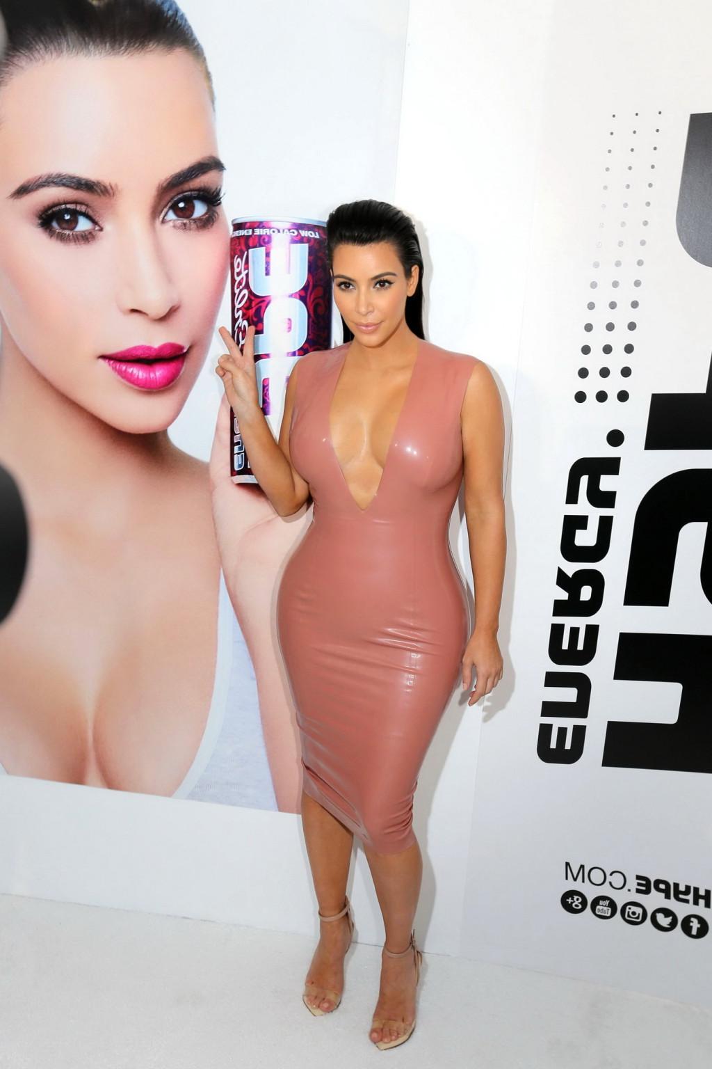 16P Kim Kardashian shows off her curvy body wearing a tight latex dress at Hype Ener
