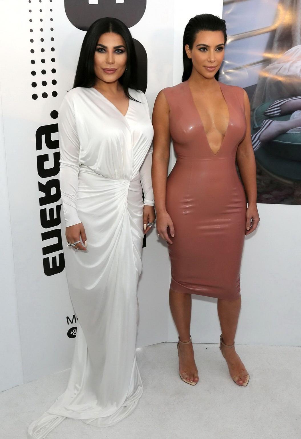 16P Kim Kardashian shows off her curvy body wearing a tight latex dress at Hype Ener