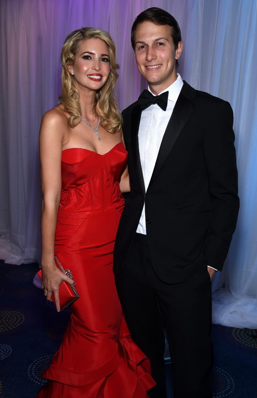 16P Ivanka Trump shows huge cleavage wearing a strapless red dress at the 101st Whit