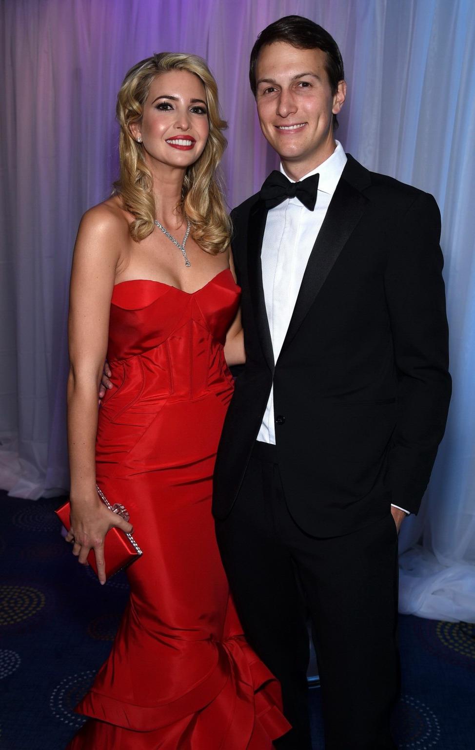 16P Ivanka Trump shows huge cleavage wearing a strapless red dress at the 101st Whit