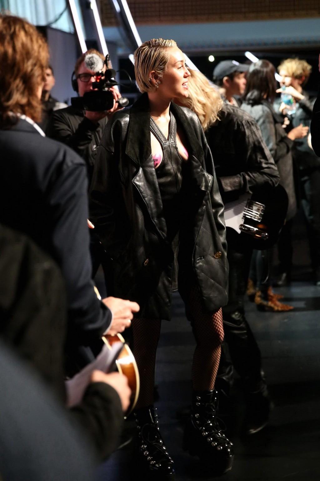 16P Miley Cyrus wearing pasties at the 30th Annual Rock And Roll Hall Of Fame Induct
